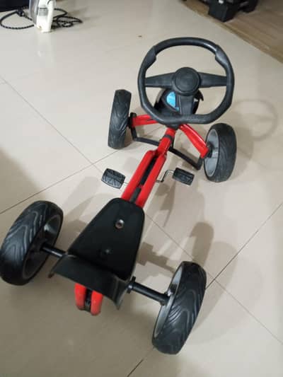 *kids pedal go-kart like car