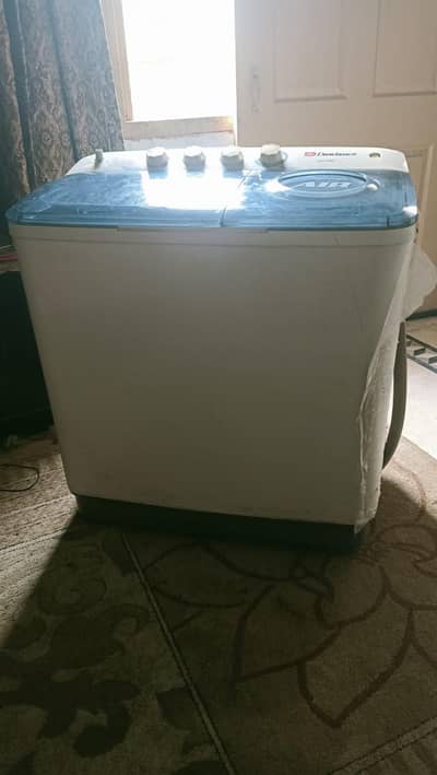 selling 2 year used 10 by 10 condition washing machine with dryer