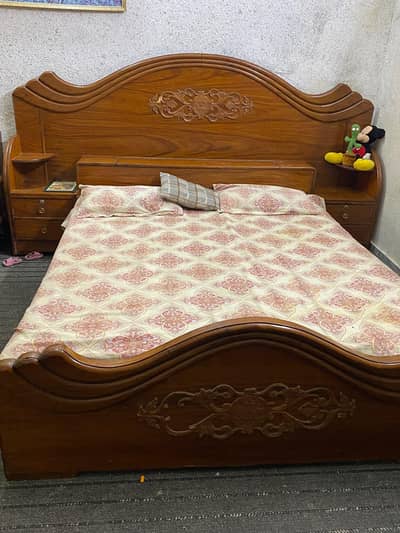 wooden double bed 