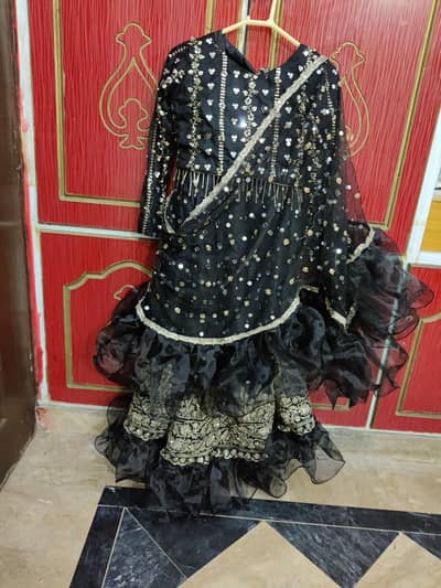 black and golden royal  embroidered bridal lehnga