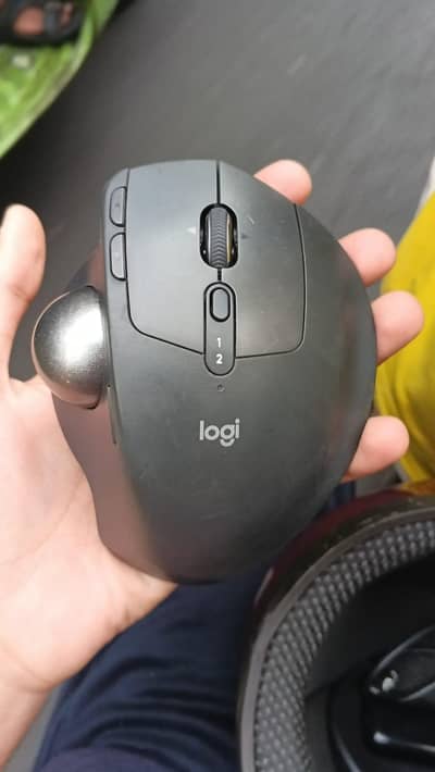 Logitech MX Ergo S with metal plate