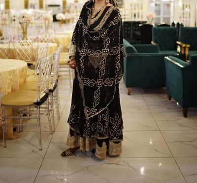 Black golden frock one time used