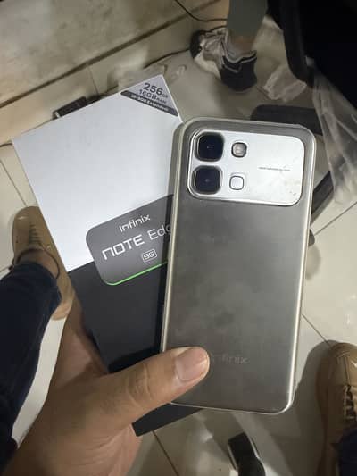 Infinix note edeg 1 year warranty