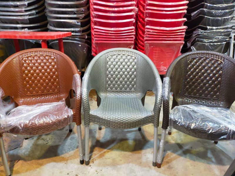 PLASTIC CHAIRS & TABLE 16