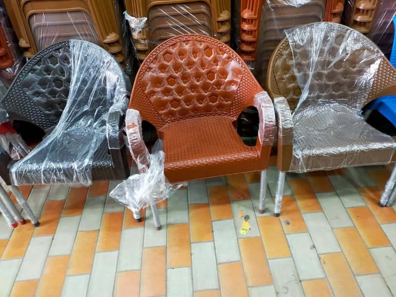 PLASTIC CHAIRS & TABLE 17