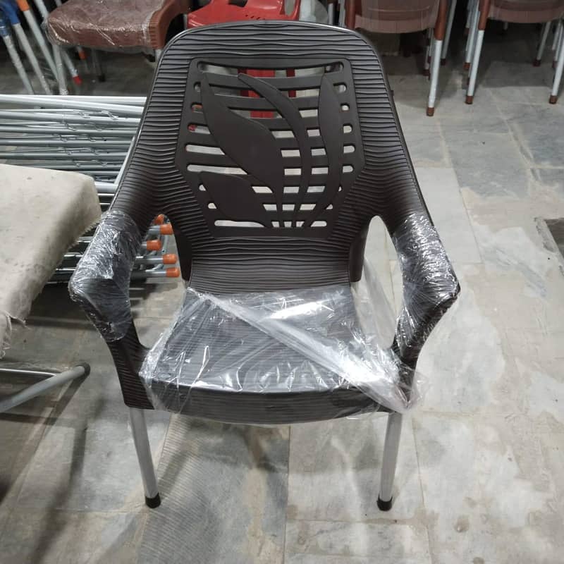 PLASTIC CHAIRS & TABLE 18