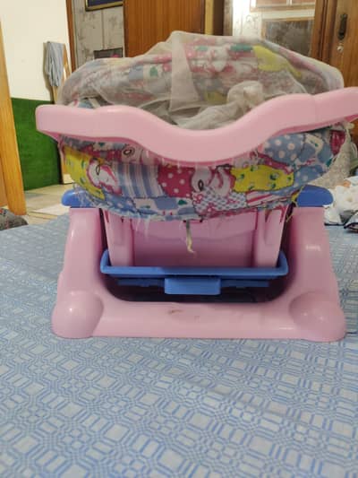 pink colour carry cot 3 in 1