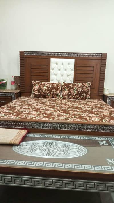 wood bed with mattress
