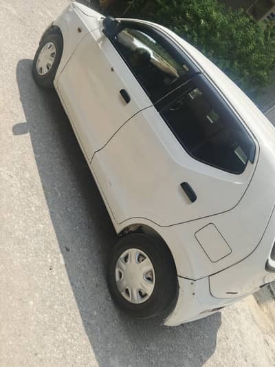 Suzuki Alto 2021 white colour Islamabad number good condition inner to