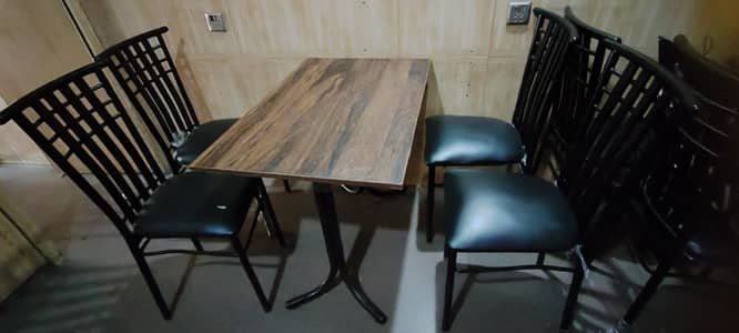 2 tables and 8 chairs