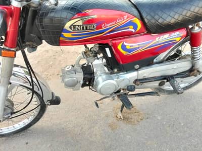 united 70cc 2021 Model- Red color -Multan Registered - condition 10/9