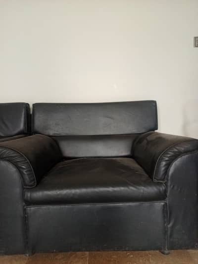 Two 1 seater sofas