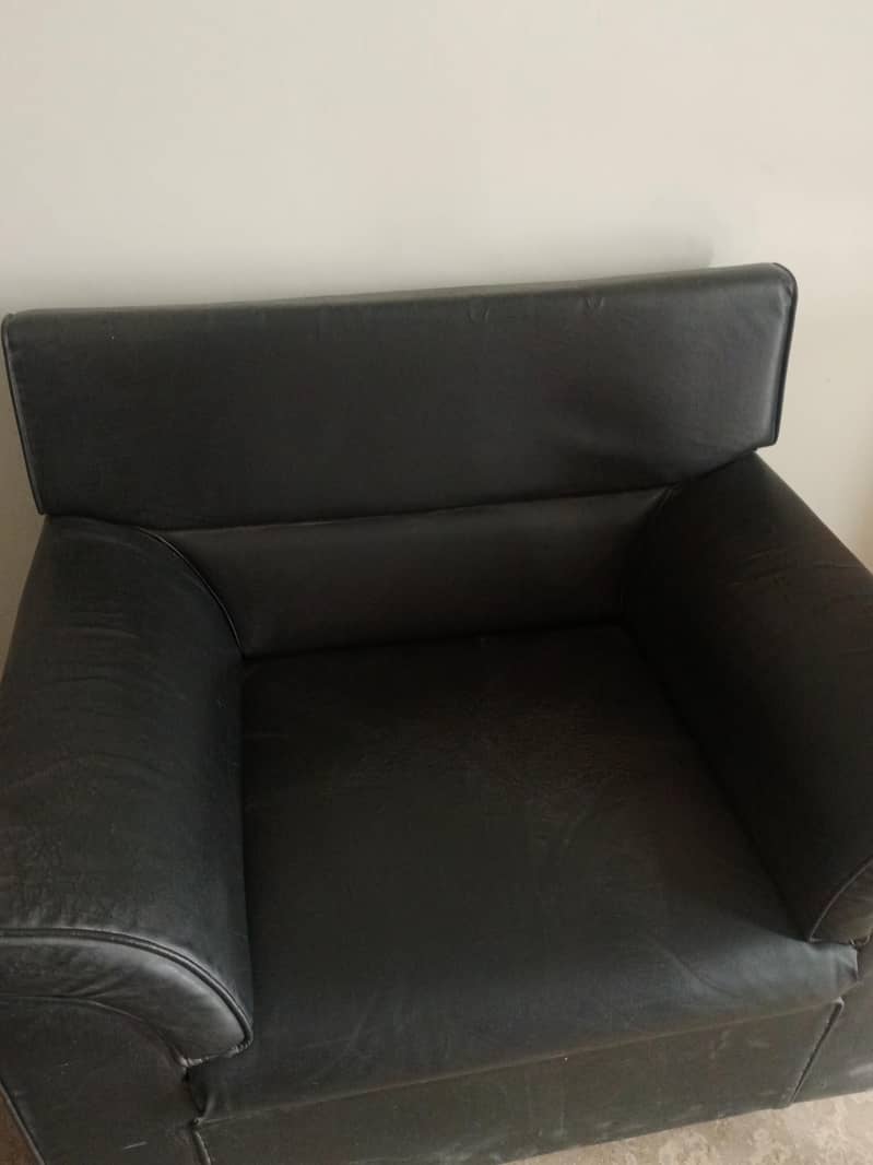 Two 1 seater sofas 2