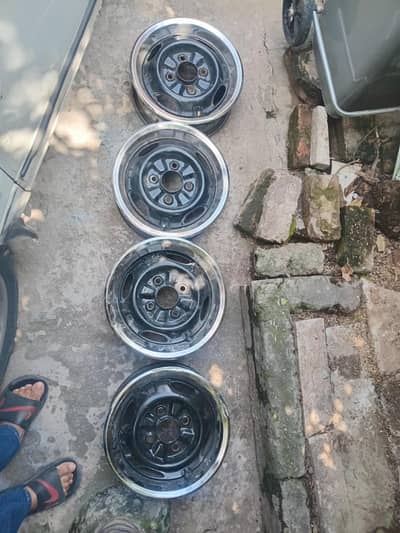 13 inch black stupney with chrome ring with tyre nozels