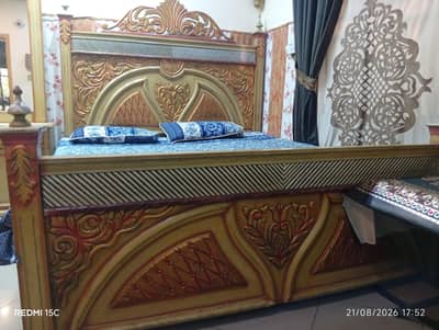 wooden bet set with side table heavy and beautiful