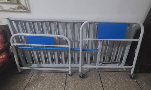 Semi foldable surgical bed