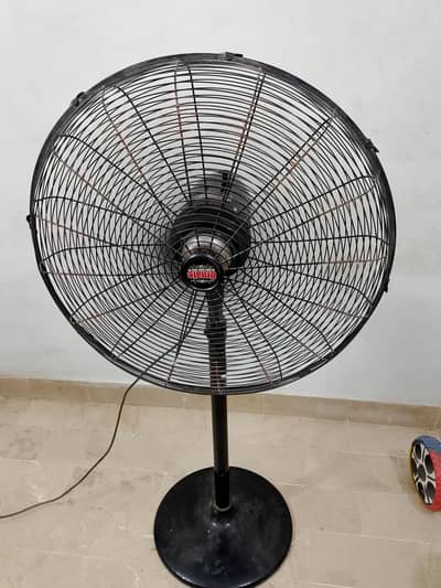 ornate pedistal fan good condition.