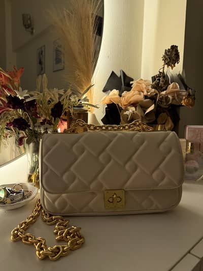 Charles & Keith Tillie Quilted Twist-Lock Shoulder Bag – Cream