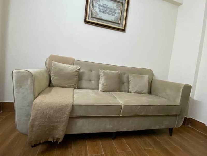 Slightly used Sofa set with Table 3