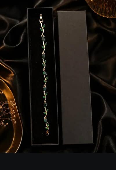 Elegant Emerald Vine Bracelet-Gold Tone Leaf Design