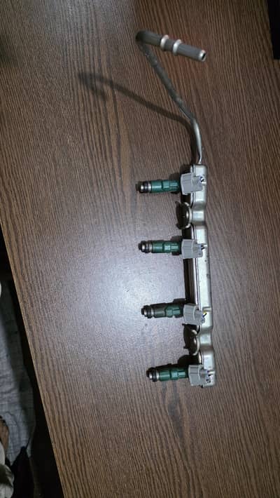 genuine Toyota fuel injector (OEM part number 23250-21020), 1znfe
