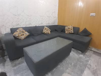 6 Seater L shaped sofa set + Table for Sale in excellent condition.