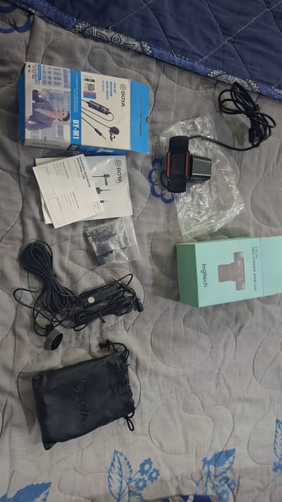 Boya by-m1 and logitech c922x  best for recording and camera