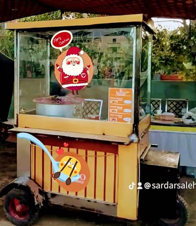 Food cart towable , with new tires, and with food warmer installed .