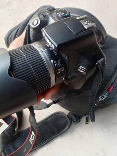 Canon 1300d with 55x250