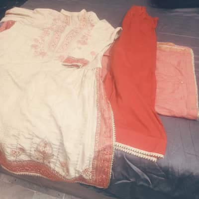 A stitched embroidery suit.