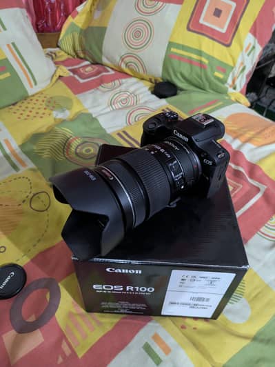 Canon R100 for sale 10/10 with box and warranty