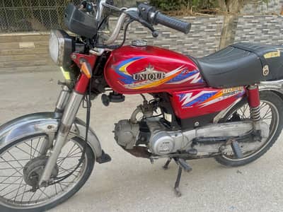Unique 70 Red Colour karachi Registered 2021 model