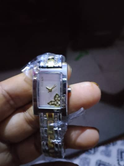 Titan Raga Classic Women's Watch (Model: 9716BM01)