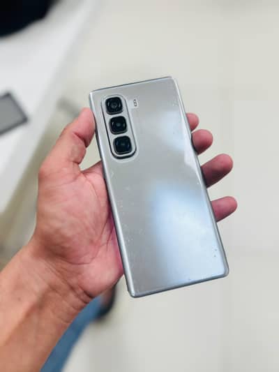 Infinix Hot 50 Pro Plus lady hand use mobile