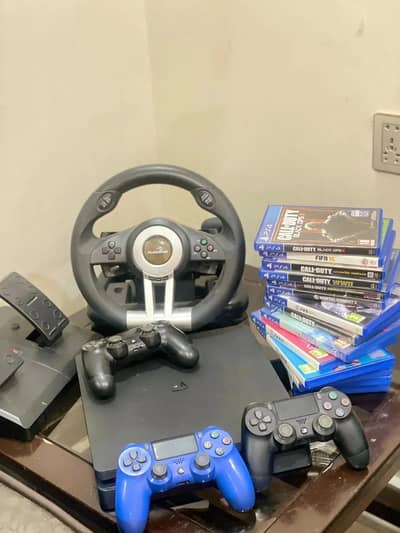 PS4 SLIM 1TB WITH GAMING WHEEL