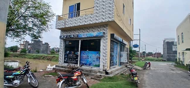 2 Marla Triple Storey With Shops And Basement Corner Building For Sale In New Amir Town Harbanspura Lahore