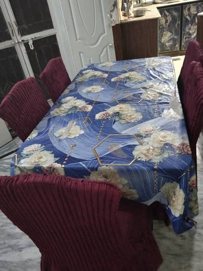 Wooden Dining table with 5 chairs and chair covers
