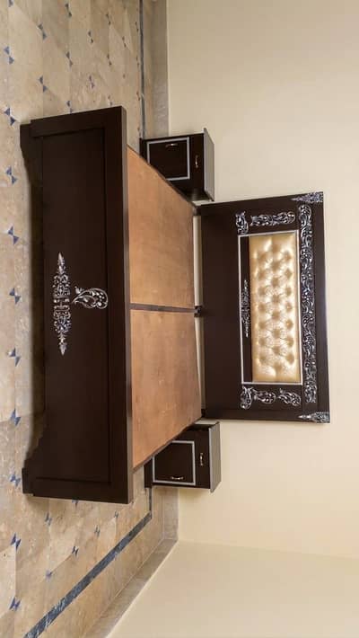 New king size double bed with side tables.