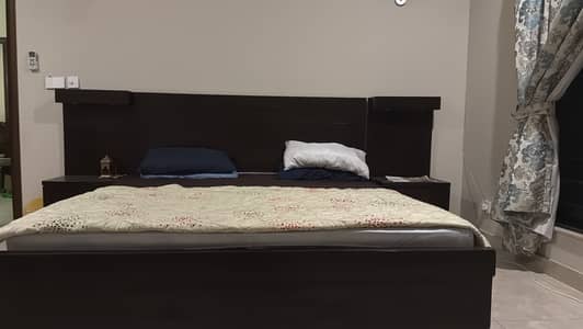 King size double bed with storage and spring mattress