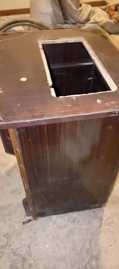 swing machine stand with cabinet and Ronnd siting table but