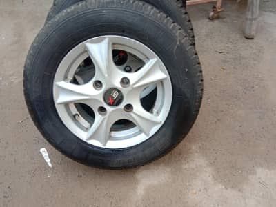 Brand New tyres size R12 8ply with alloy rims.