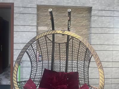 It’s an swing  2 people can sit on it it is slightly used