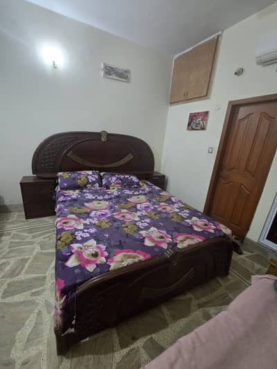 Classic wood bed with two side tables good condition