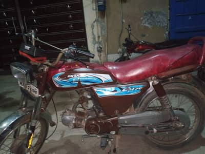 documents clear hai bike ke addition thodi si rough hai front tyre aur