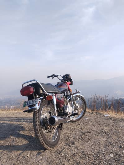 Honda 125 RED COLOR Model 2011 Number PUNJAB LEX 7569