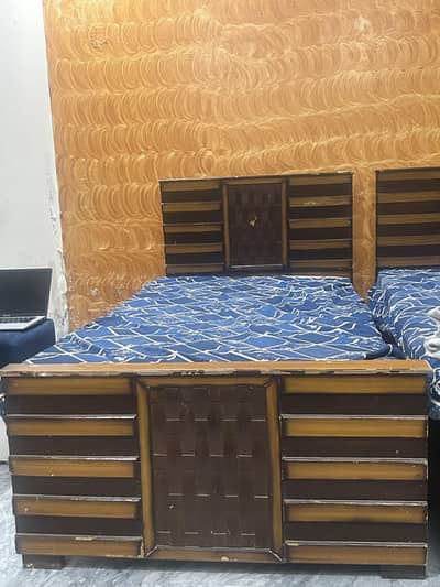 two beds and mattress