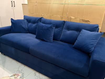 blue velvet sofa. Excellent condition.