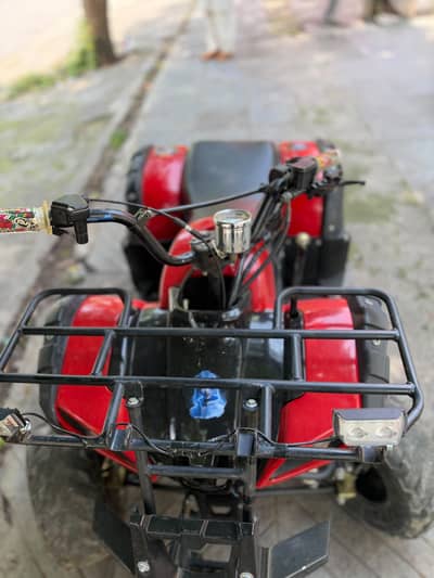 Modified Red Quad bike