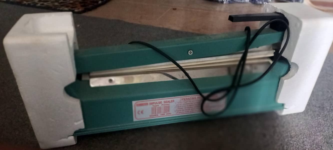 Sealing machine 1