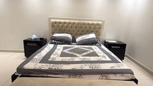 Bed with two side tables